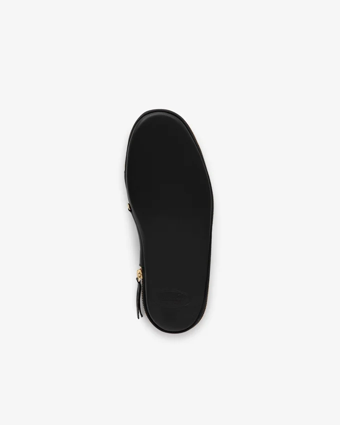 Chaussons de voyage en cuir