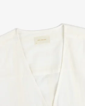 Chemise à rayures jacquard nouée sur le devant