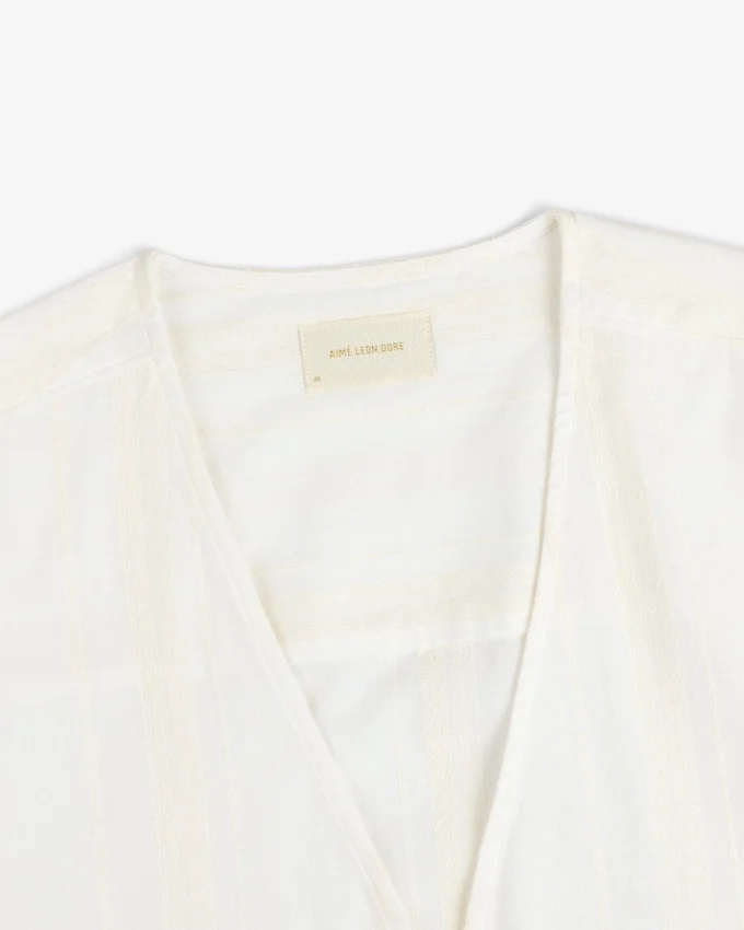 Chemise à rayures jacquard nouée sur le devant