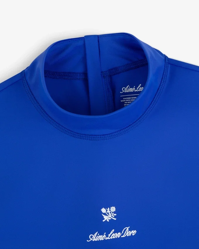 Maillot de protection à manches courtes avec écusson