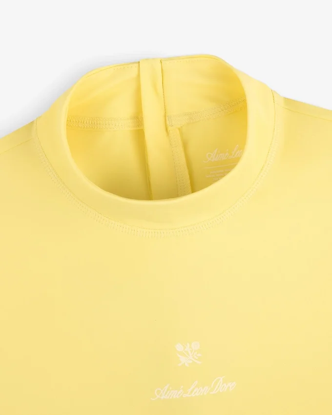 Maillot de protection à manches courtes avec écusson
