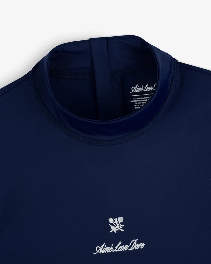 Maillot de protection à manches courtes avec écusson