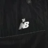 Pantalon d'échauffement léger en nylon ALD / New Balance