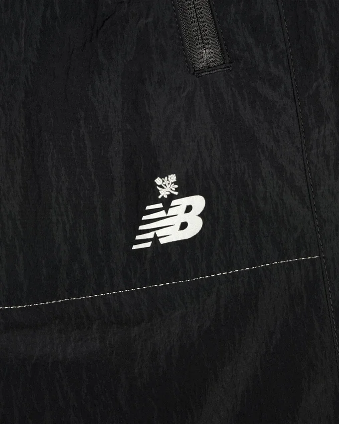 Pantalon d'échauffement léger en nylon ALD / New Balance
