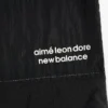 Pantalon d'échauffement léger en nylon ALD / New Balance
