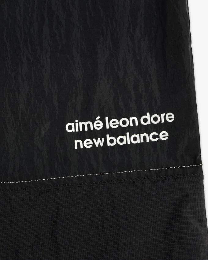 Pantalon d'échauffement léger en nylon ALD / New Balance
