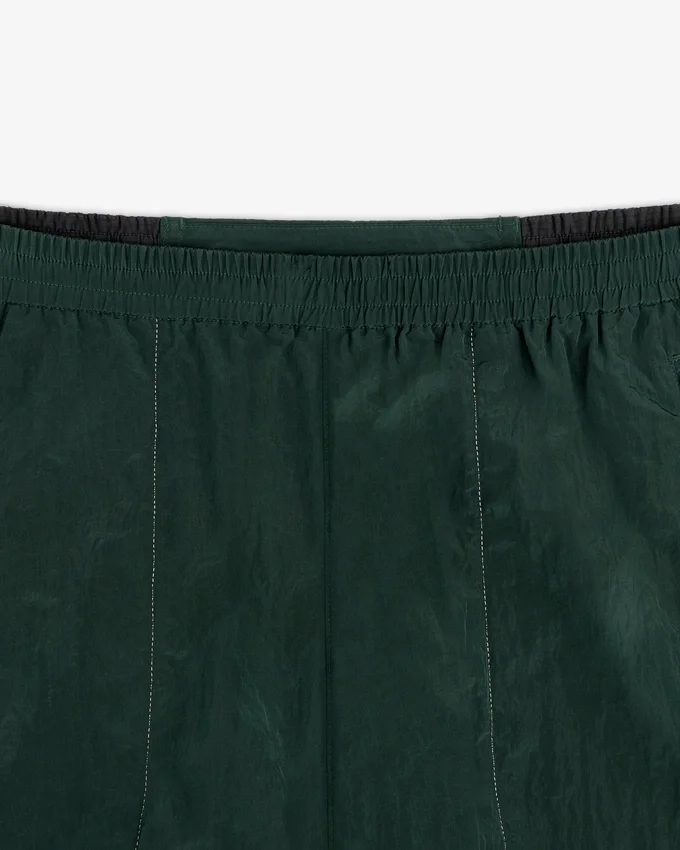 Pantalon d'échauffement léger en nylon ALD / New Balance