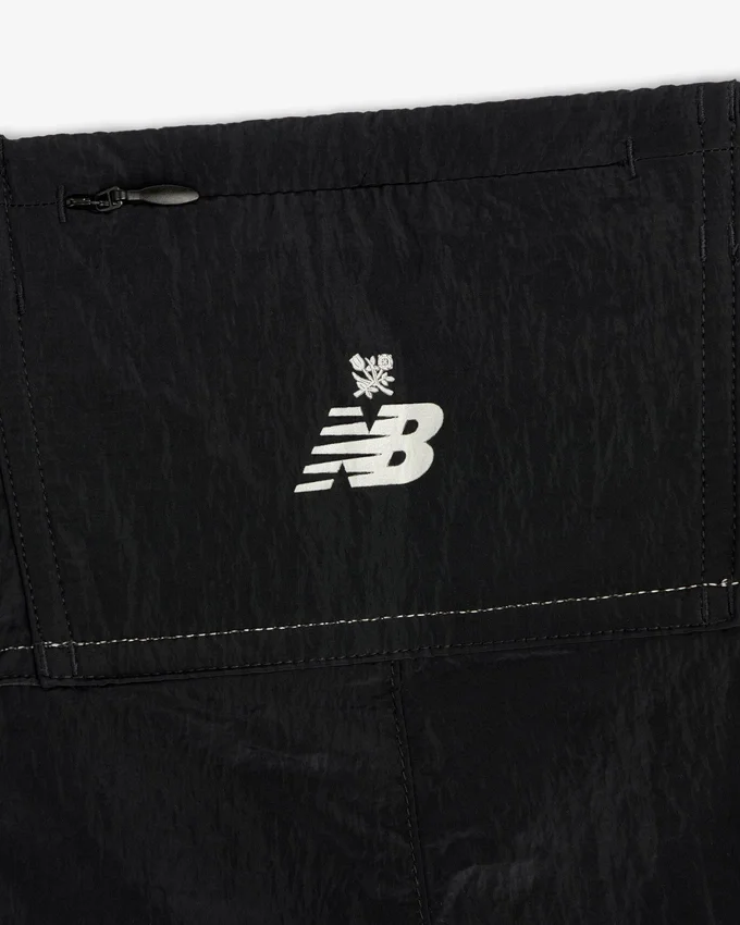 Pantalon d'échauffement léger en nylon ALD / New Balance