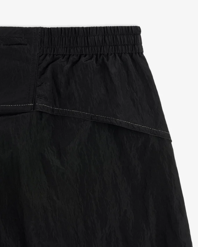 Pantalon d'échauffement léger en nylon ALD / New Balance