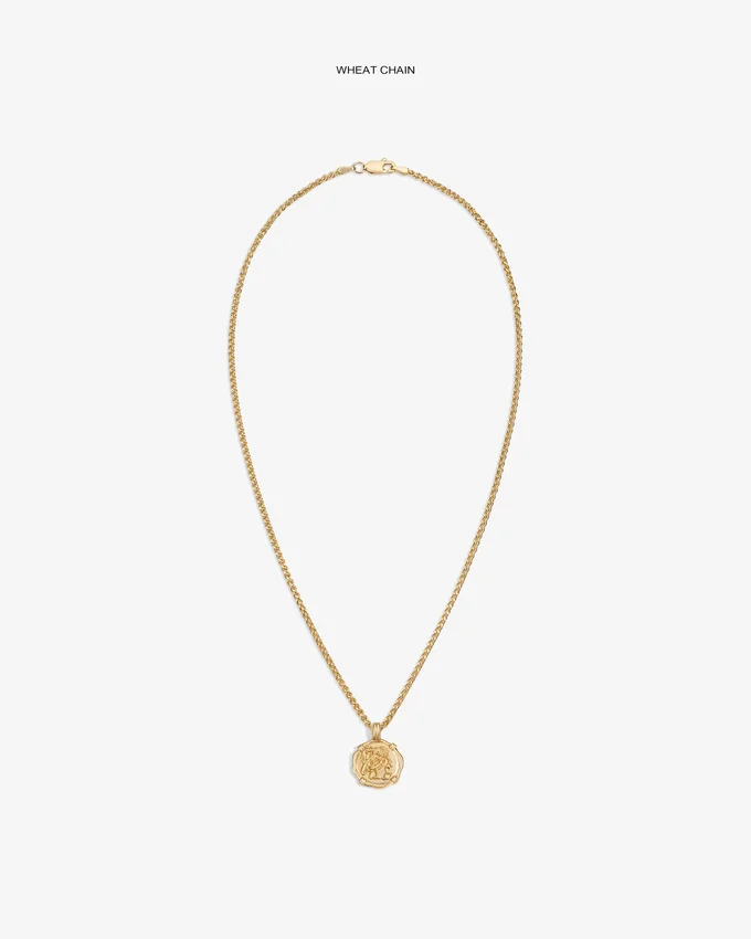Pendentif en forme de pièce d’or 14 carats