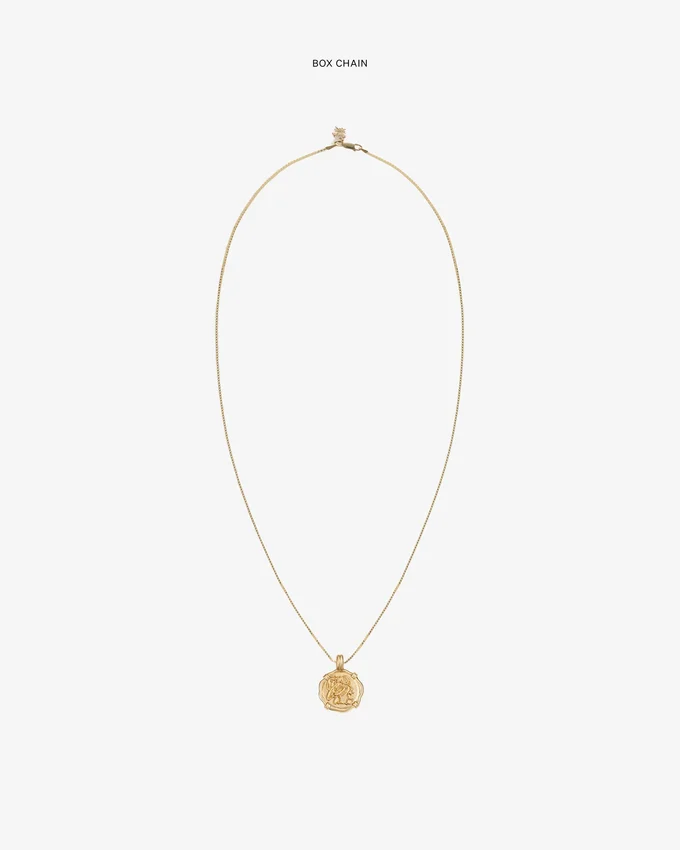Pendentif en forme de pièce d’or 14 carats