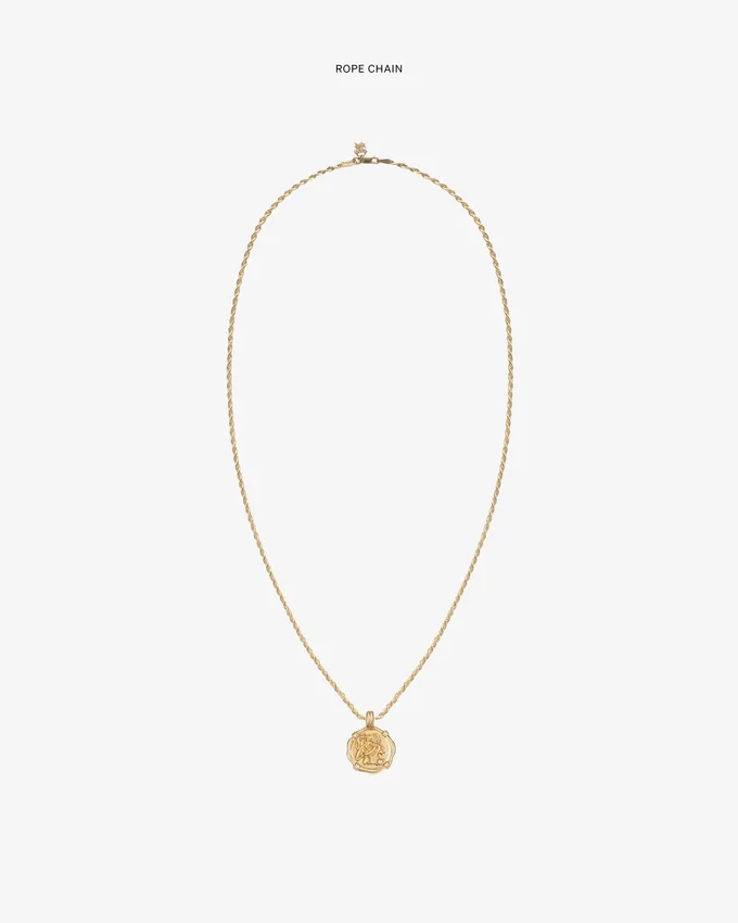 Pendentif en forme de pièce d’or 14 carats