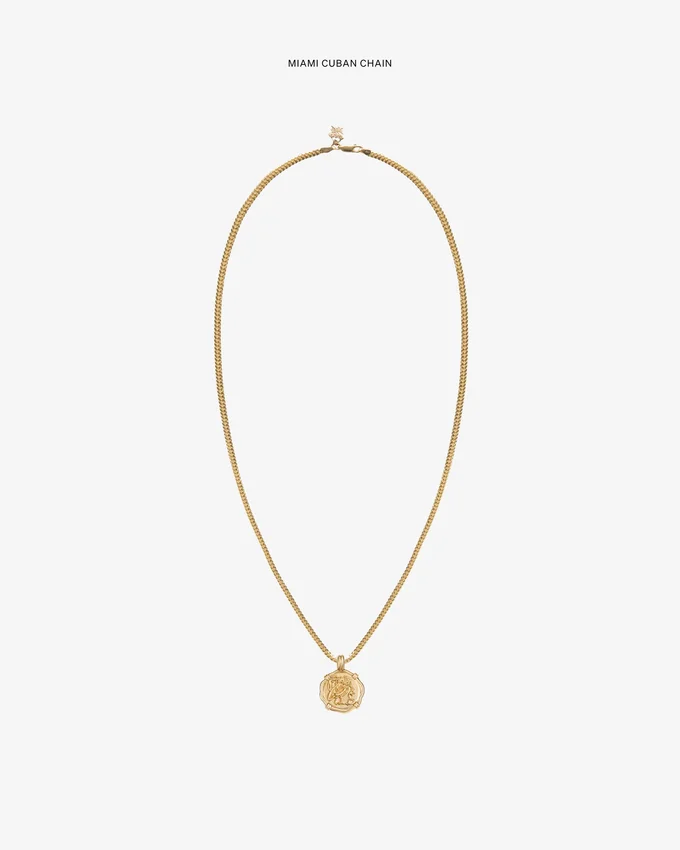 Pendentif en forme de pièce d’or 14 carats