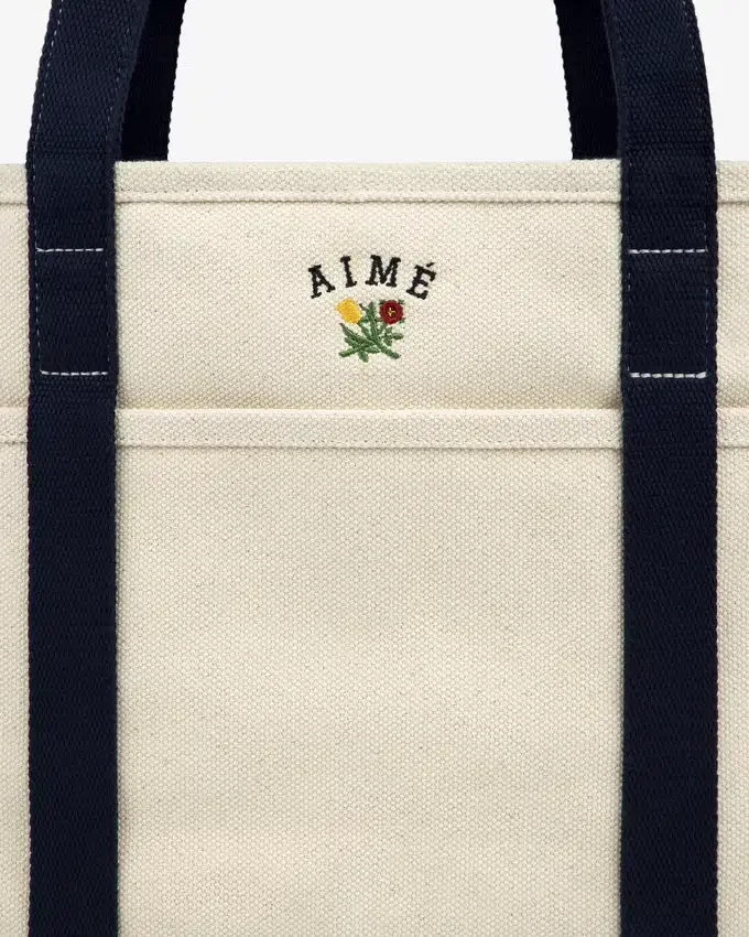 Petit sac fourre-tout avec écusson contrasté