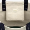Petit sac fourre-tout avec écusson contrasté