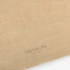 Petite pochette en nubuck gaufré croco