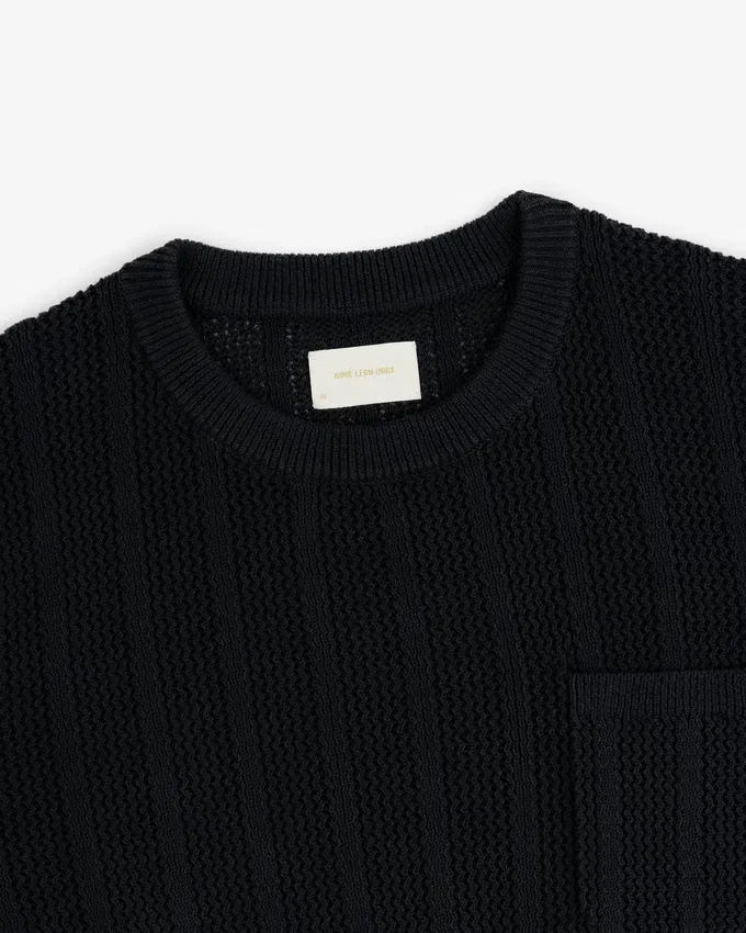 Pull à col rond avec coutures en chevrons