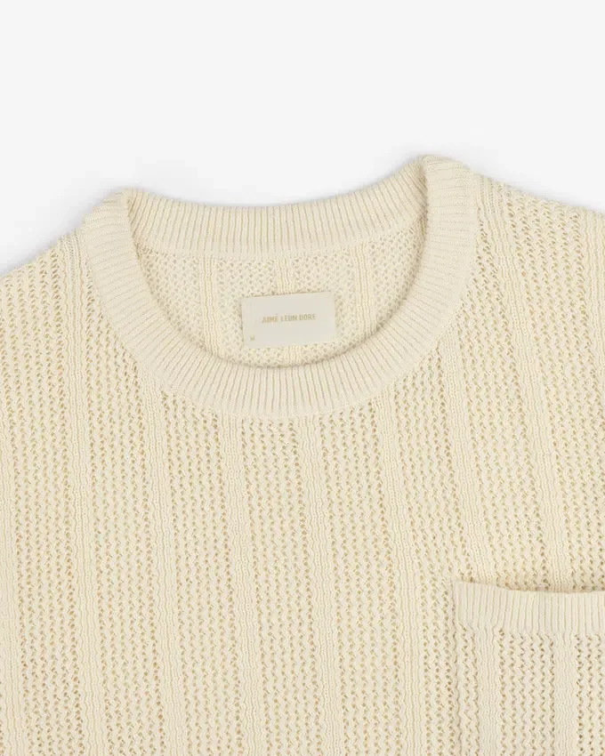Pull à col rond avec coutures en chevrons