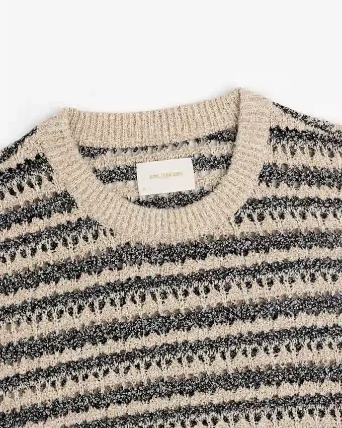 Pull à col rond en maille ajourée bouclée