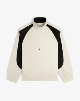 Pull en nylon à demi-zip avec écusson