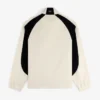 Pull en nylon à demi-zip avec écusson