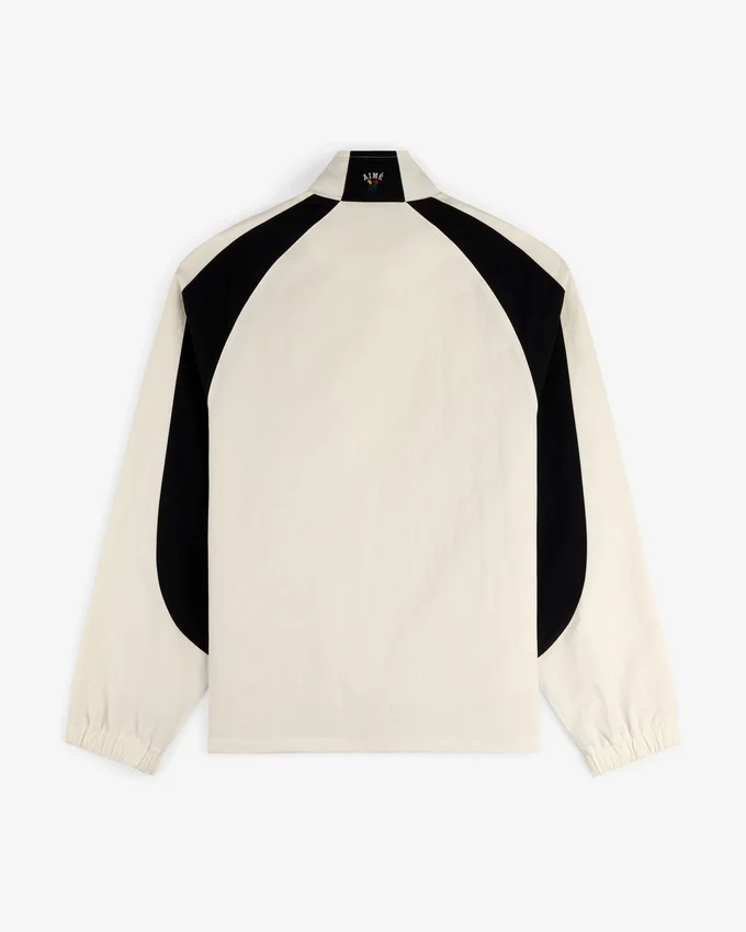 Pull en nylon à demi-zip avec écusson