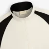 Pull en nylon à demi-zip avec écusson