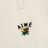 Pull en nylon à demi-zip avec écusson