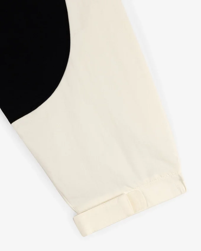 Pull en nylon à demi-zip avec écusson