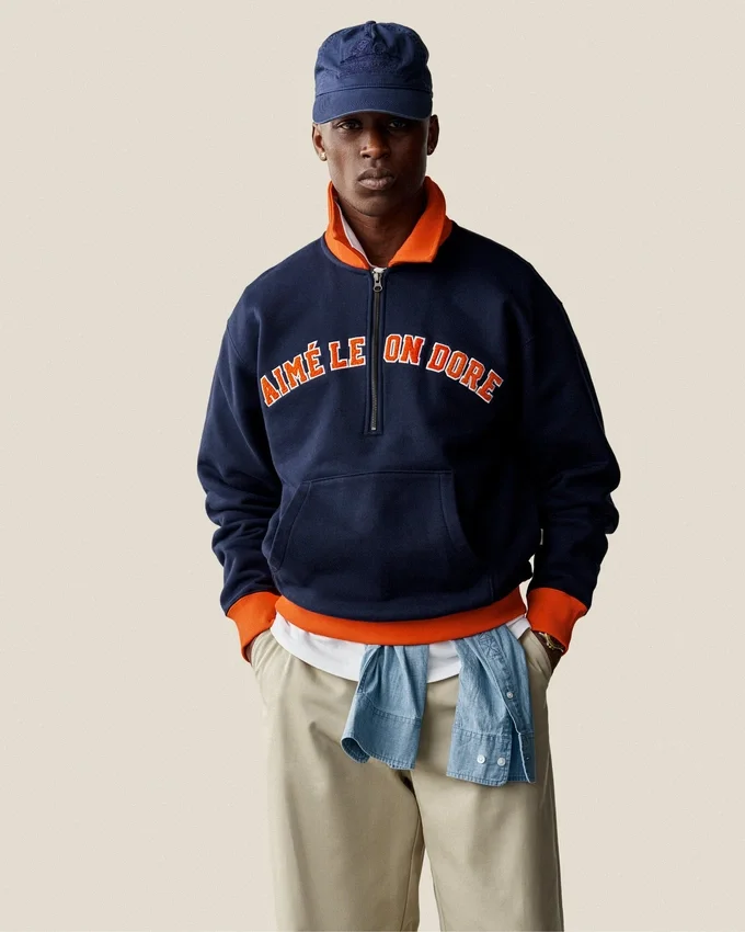 Pull universitaire à quart de zip