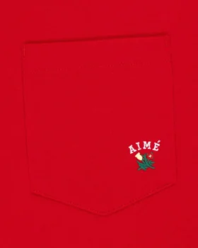T-shirt à poche avec écusson