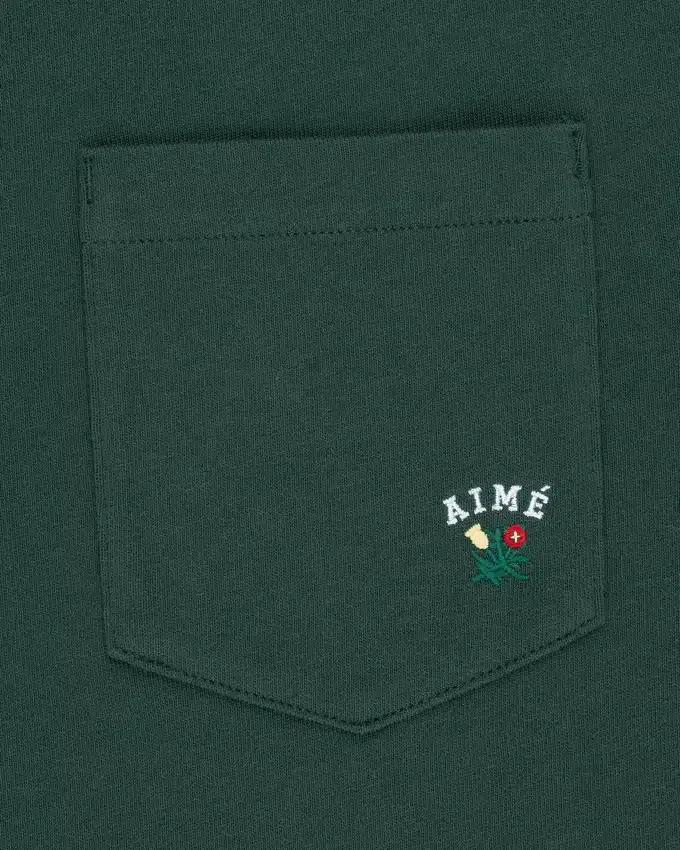 T-shirt à poche avec écusson