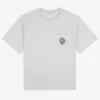 T-shirt à poche avec écusson botanique